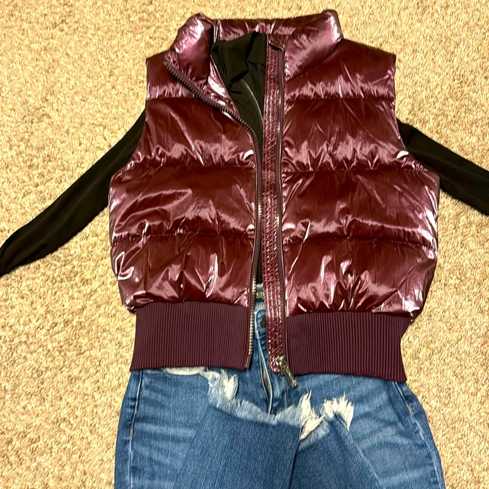 {. Calvin Klein purple vest.
